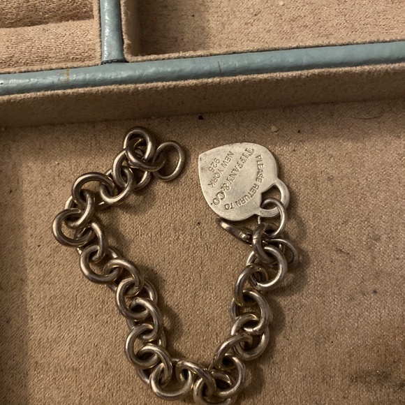 Tiffany and Co silver chain bracelet. Silver heart pendant.